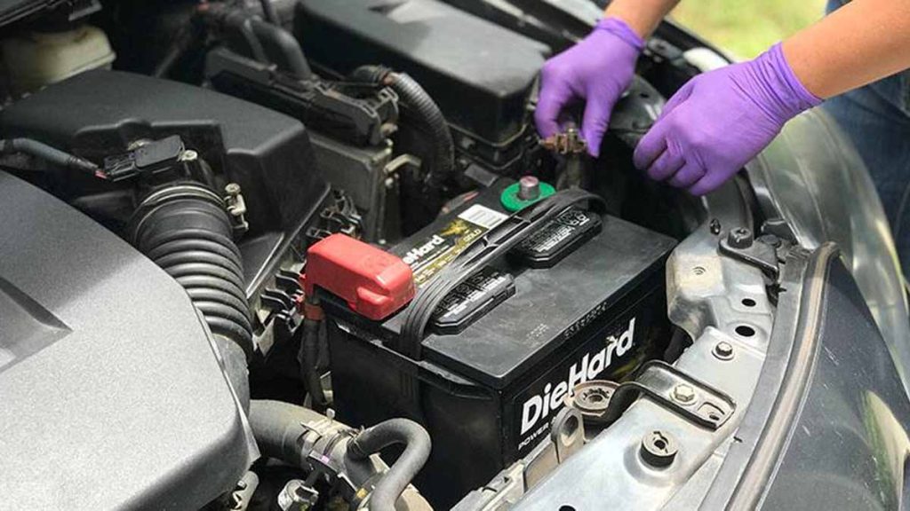 putting battery in car