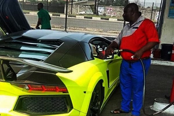 Lamborghini Aventador being refilled at a Lagos gas station