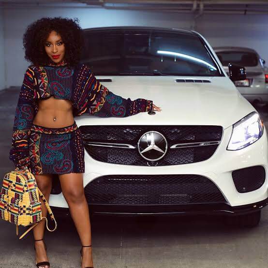 Jackie Aina posing with her Mercedes-AMG GLE 63 S Coupè 585 HP V8 BITURBO