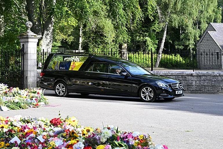 The Queen's funeral cortege is seen leaving Balmoral Castle on September 11, 2022 in Aberdeen, Scotland