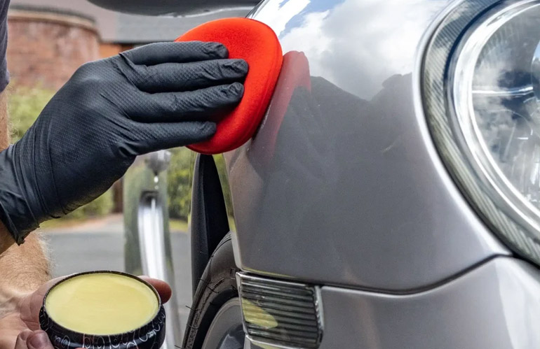 Car waxing involves applying products to your car’s exterior panel