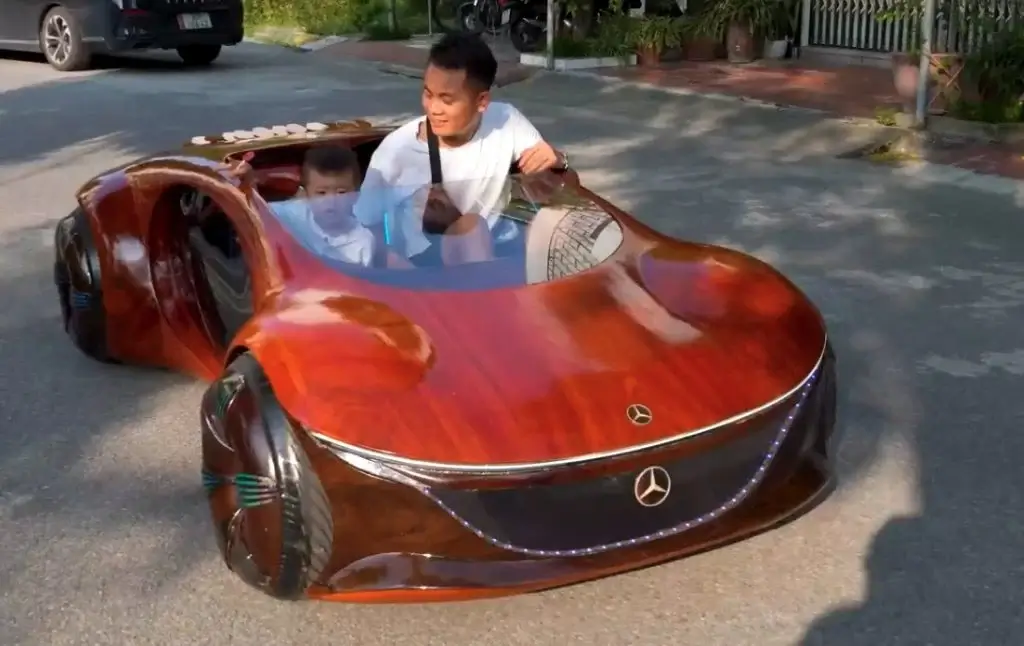 Mr. Dao Driving The Wood-Made Mercedes Vision AVTR With Son