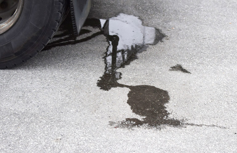 What Are Common Causes of Water Leaking from Under a Car