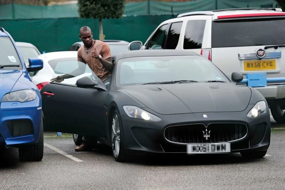 Mario Balotelli hops into a Maserati in 2011