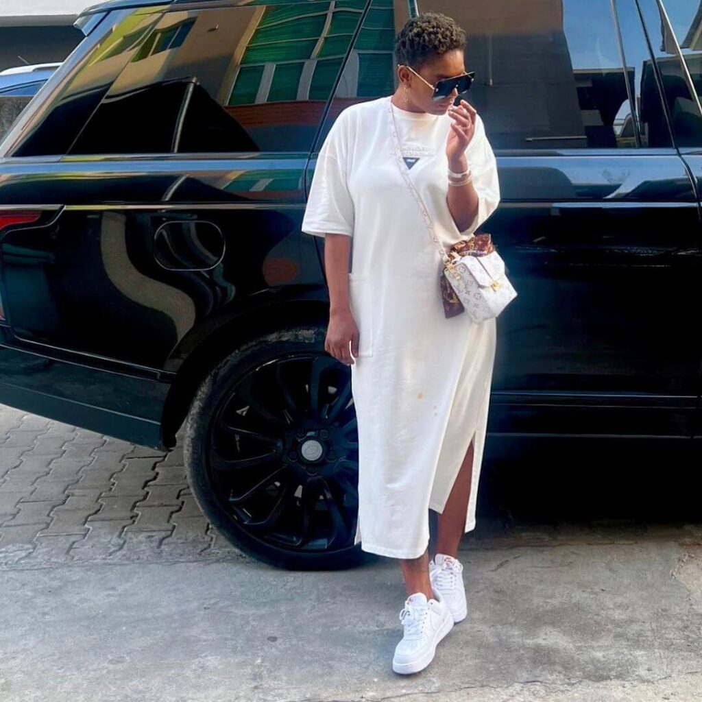 Annie Idibia pose with range rover