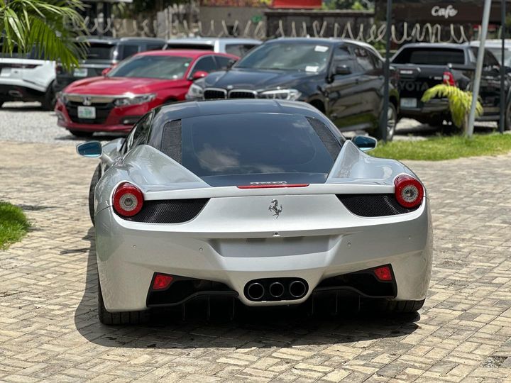 back view of Zinoleesky buys 2014 Ferrari 458 Spider