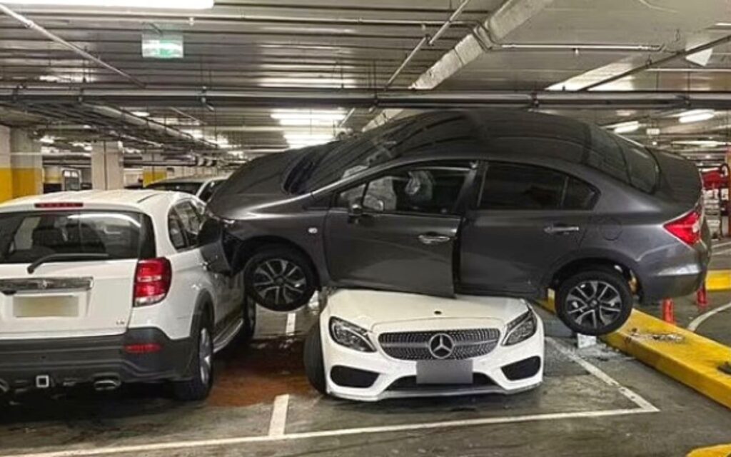 Parking Gone Wrong: Driver Climbs A Mercedes Benz With A Honda Civic