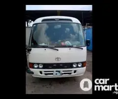 Toyota Coaster Bus for rental services