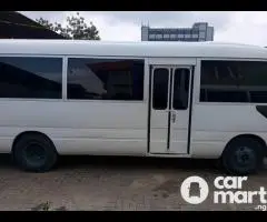 Toyota Coaster Bus for rental services